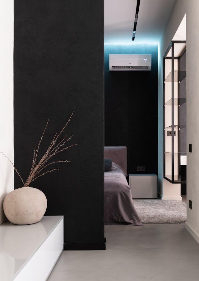 Modern living space with wall-mounted air conditioner for energy-efficient cooling